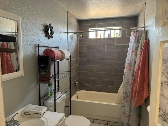 full bathroom with sink, shower / bathtub combination with curtain, a textured ceiling, and toilet