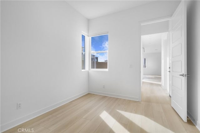 empty room featuring light hardwood / wood-style floors