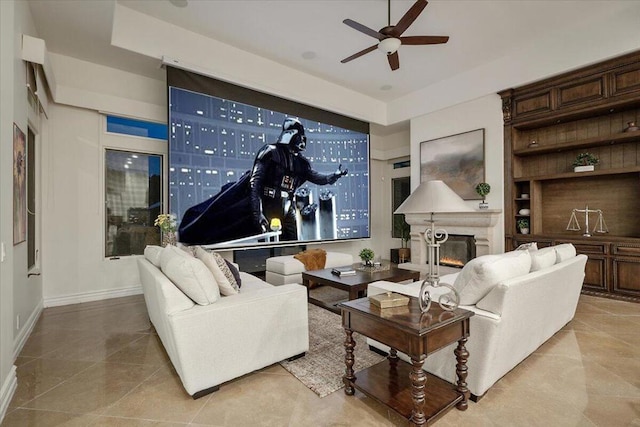 tiled living room featuring ceiling fan