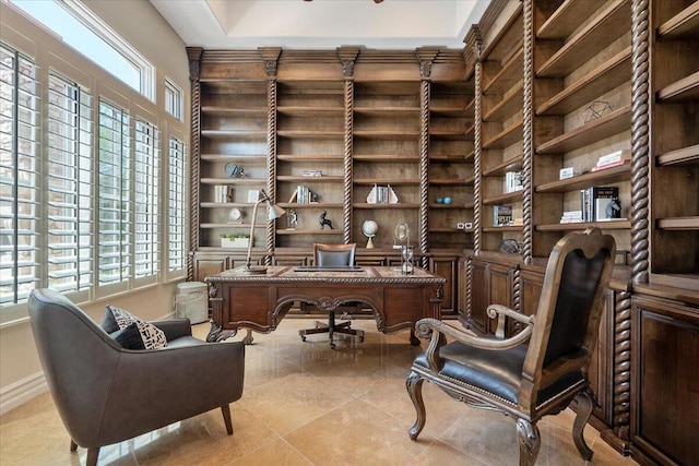 home office featuring light tile patterned flooring and plenty of natural light