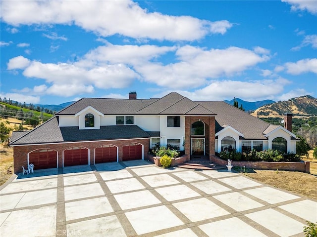 view of front of home with a mountain view