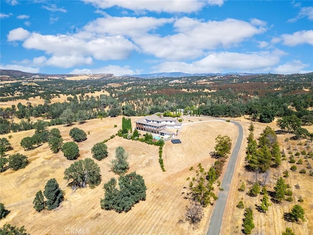 birds eye view of property featuring a rural view