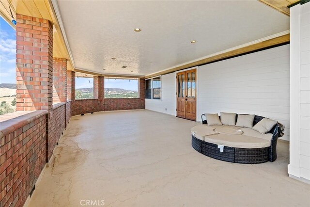 view of patio with a mountain view