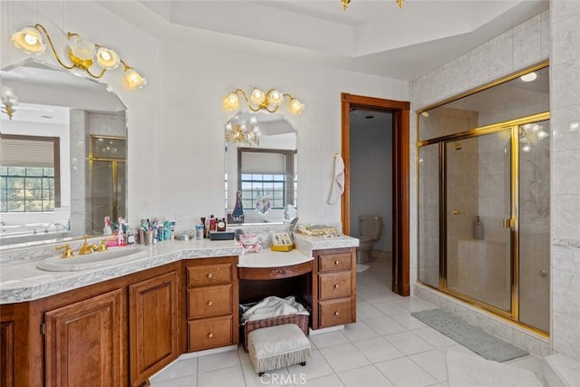 bathroom with toilet, walk in shower, and a wealth of natural light