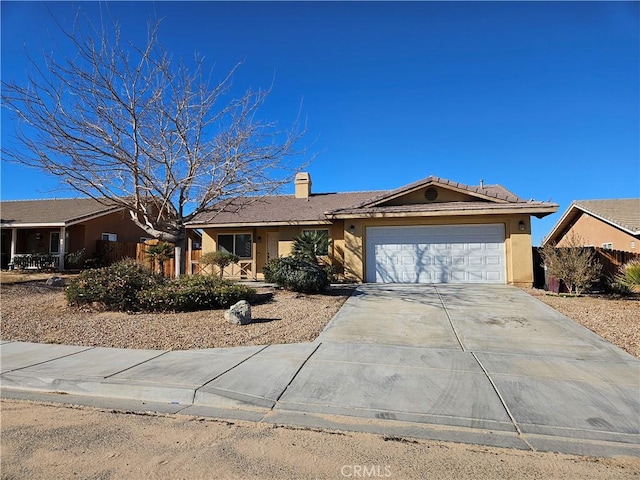 ranch-style house featuring a garage