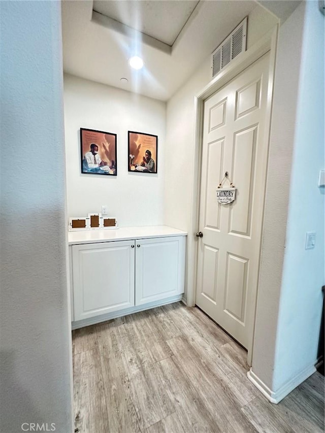 entrance foyer with light hardwood / wood-style flooring