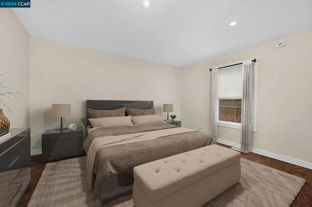 bedroom featuring dark hardwood / wood-style floors