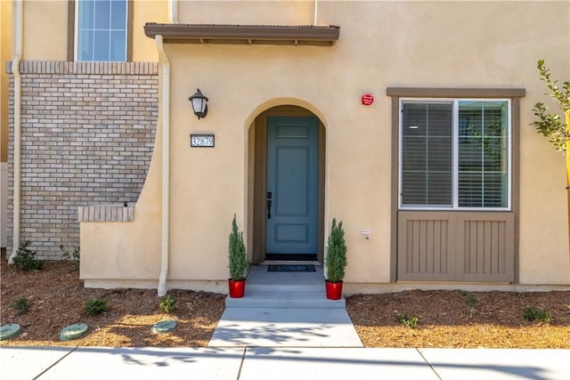 32879 Brunello Way, Temecula, CA 92591 - entrance to property featuring stucco siding and brick siding
