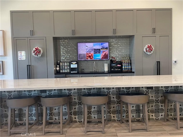 32879 Brunello Way, Temecula, CA 92591 - indoor bar with light wood finished floors