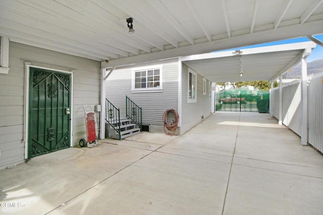 view of patio featuring a carport