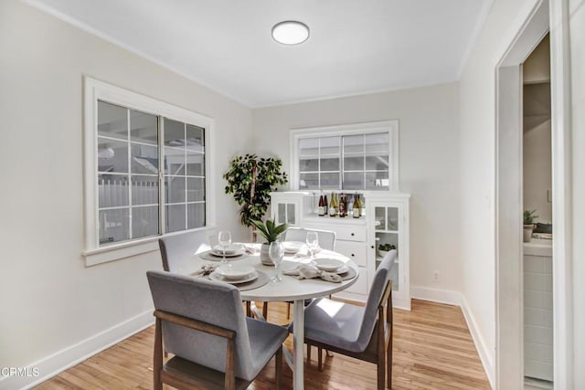 dining space featuring light hardwood / wood-style floors