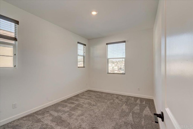 view of carpeted spare room