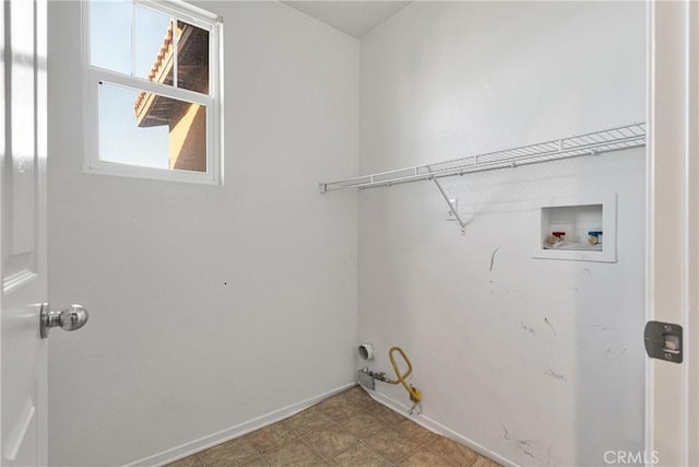 clothes washing area featuring gas dryer hookup and hookup for a washing machine