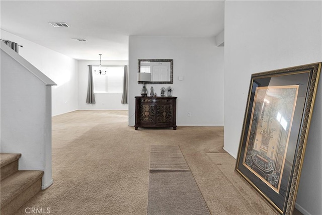 hallway with light carpet