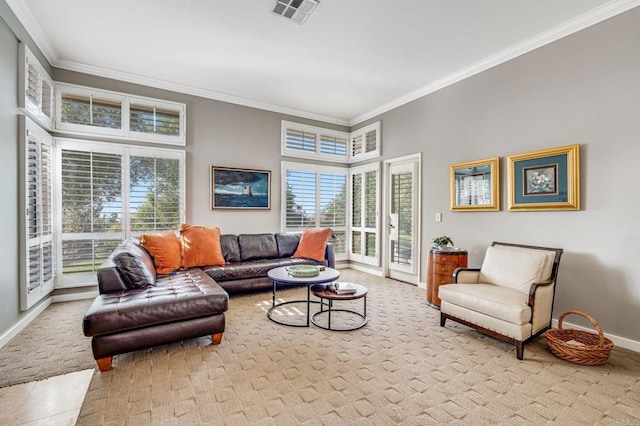 living room with light colored carpet, a high ceiling, and ornamental molding