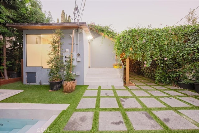 view of outdoor structure with a yard