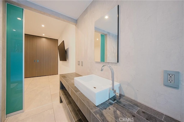 bathroom featuring tile patterned floors and sink