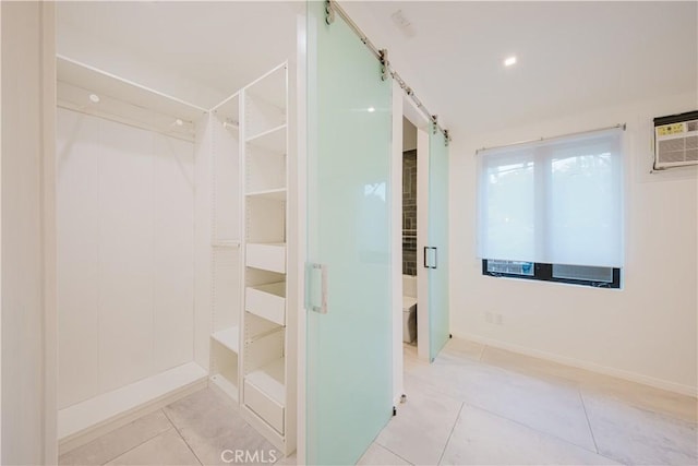 bathroom with tile patterned flooring and toilet