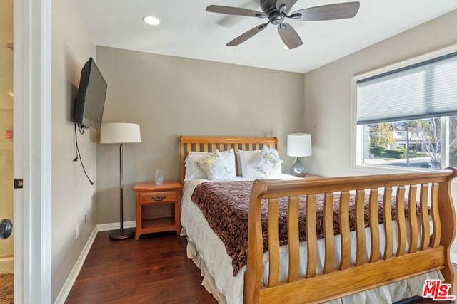 bedroom with ceiling fan and dark wood-type flooring