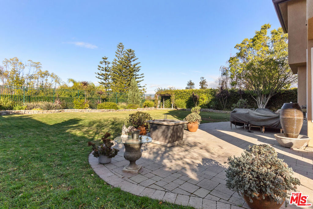 view of patio with a grill