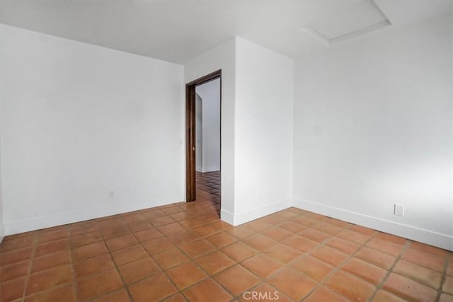 view of tiled spare room