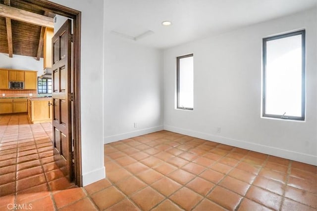 empty room with light tile patterned flooring