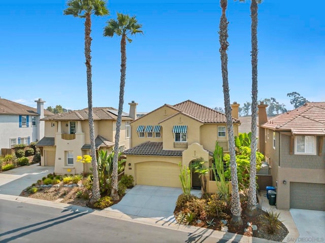 view of front of property with a garage