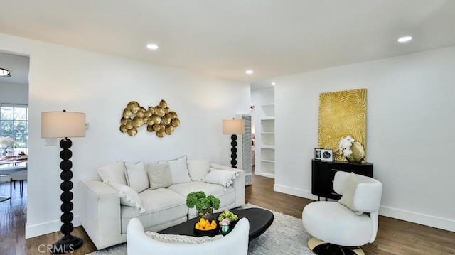 living room featuring dark hardwood / wood-style flooring