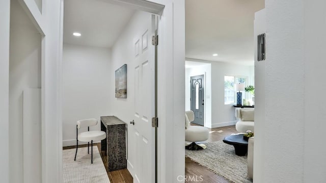 hall featuring hardwood / wood-style floors