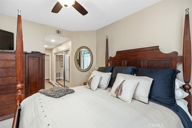 bedroom featuring ceiling fan and a closet