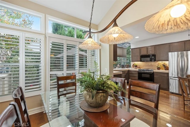 dining area featuring hardwood / wood-style flooring