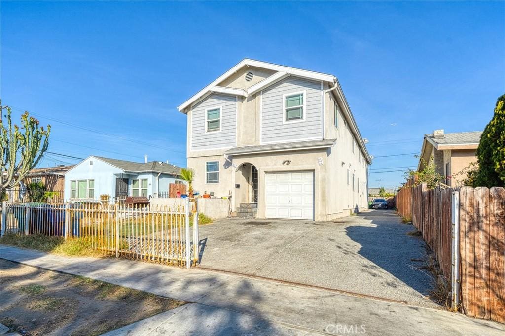 view of property with a garage