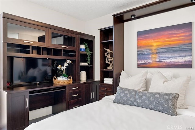 bedroom with a textured ceiling