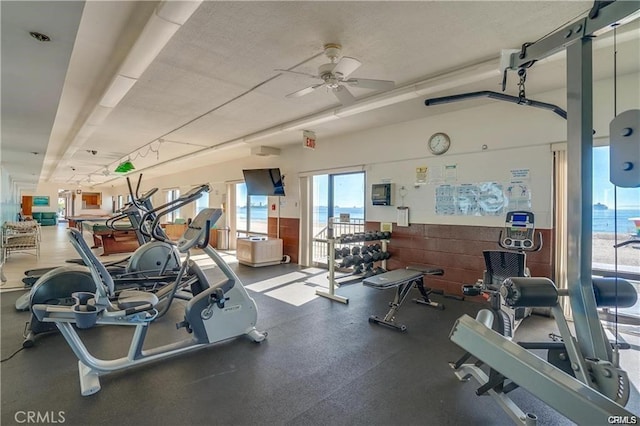 gym with ceiling fan