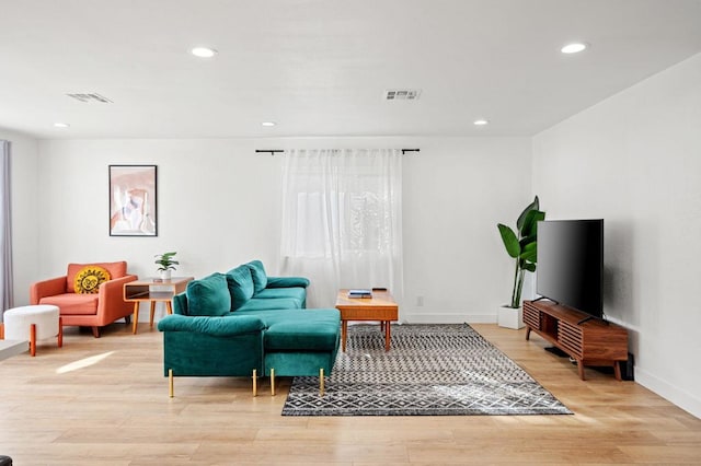 living area featuring light hardwood / wood-style floors