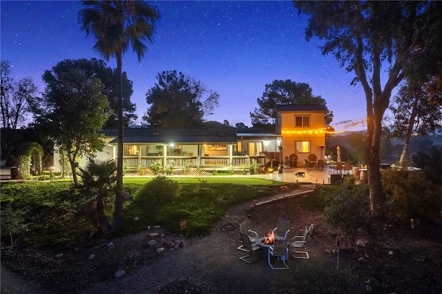 41026 Los Amantes Rd, Temecula, CA 92592 - back of house with an outdoor fire pit and a deck