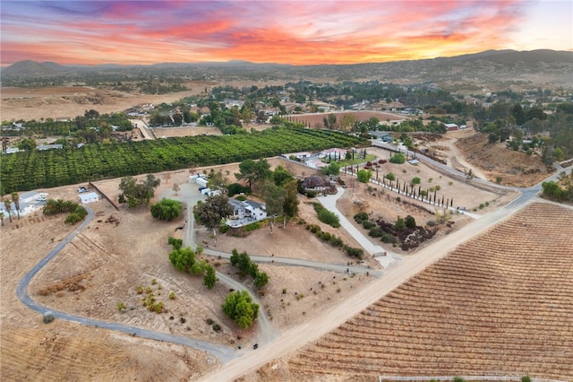 41026 Los Amantes Rd, Temecula, CA 92592 - aerial view at dusk of agricultural area, a view of countryside, and a mountain view