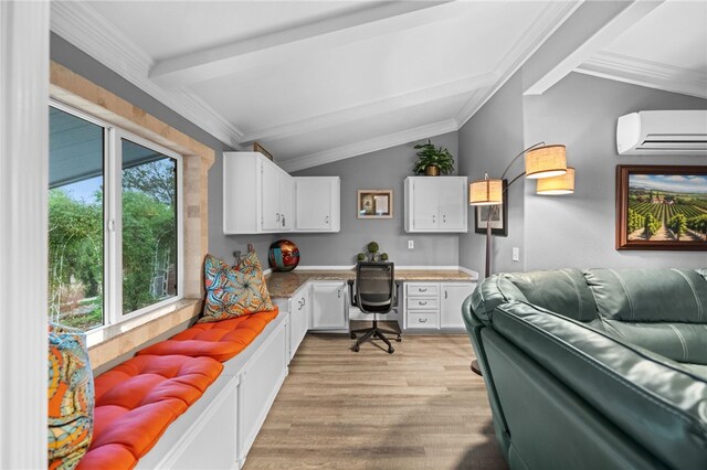 41026 Los Amantes Rd, Temecula, CA 92592 - home office with an AC wall unit, built in desk, light wood-type flooring, and ornamental molding