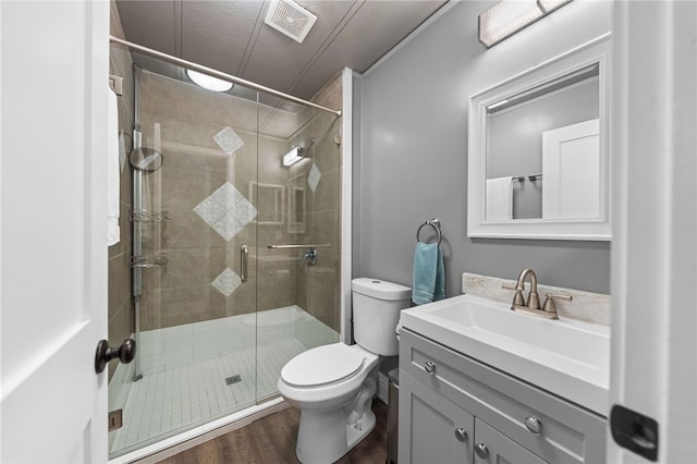 41026 Los Amantes Rd, Temecula, CA 92592 - full bathroom with vanity, a shower stall, and wood finished floors