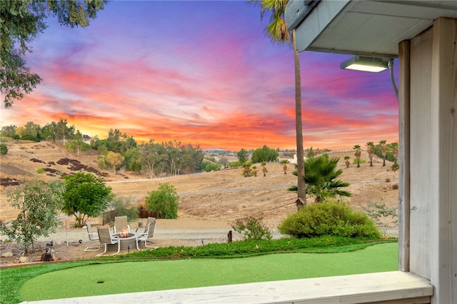 41026 Los Amantes Rd, Temecula, CA 92592 - view of yard with a putting area, a rural view, and a fire pit