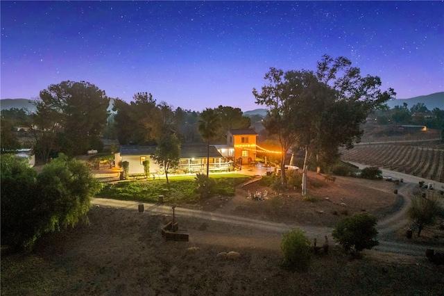 41026 Los Amantes Rd, Temecula, CA 92592 - yard at dusk with driveway