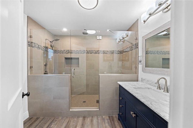 41026 Los Amantes Rd, Temecula, CA 92592 - full bath with vanity, a shower stall, and wood finished floors