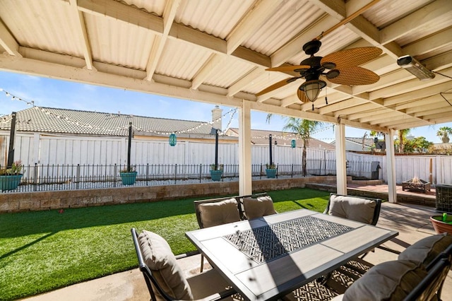 view of patio / terrace featuring ceiling fan