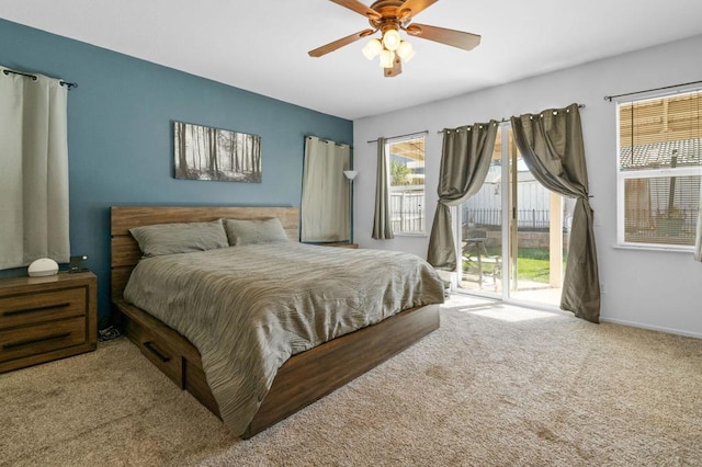 bedroom with carpet flooring, ceiling fan, and access to outside