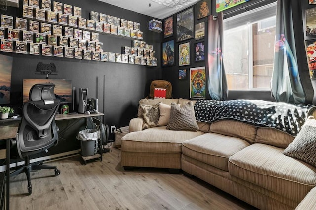 sitting room featuring hardwood / wood-style flooring