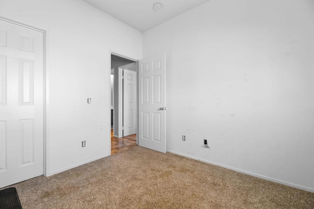 unfurnished bedroom featuring carpet flooring