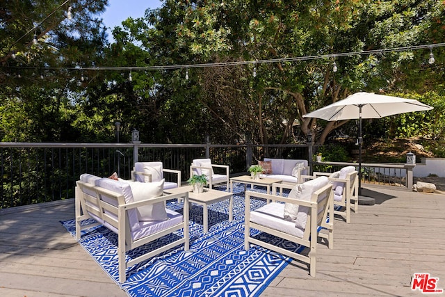 deck featuring an outdoor living space