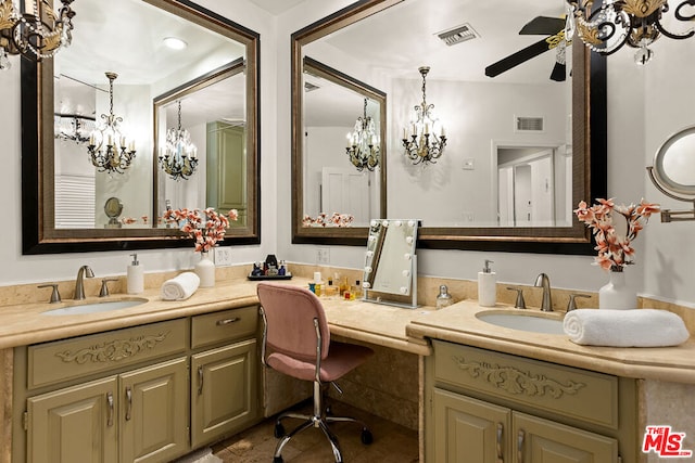 bathroom featuring ceiling fan and vanity