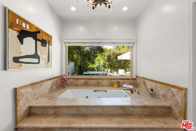 bathroom with tiled tub