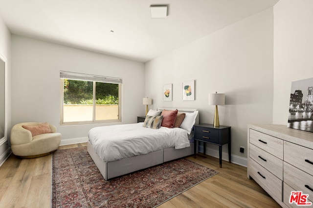 bedroom featuring light hardwood / wood-style floors